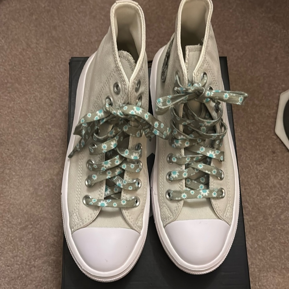 Converse high top sneaker size 7 1/2. Color light bone